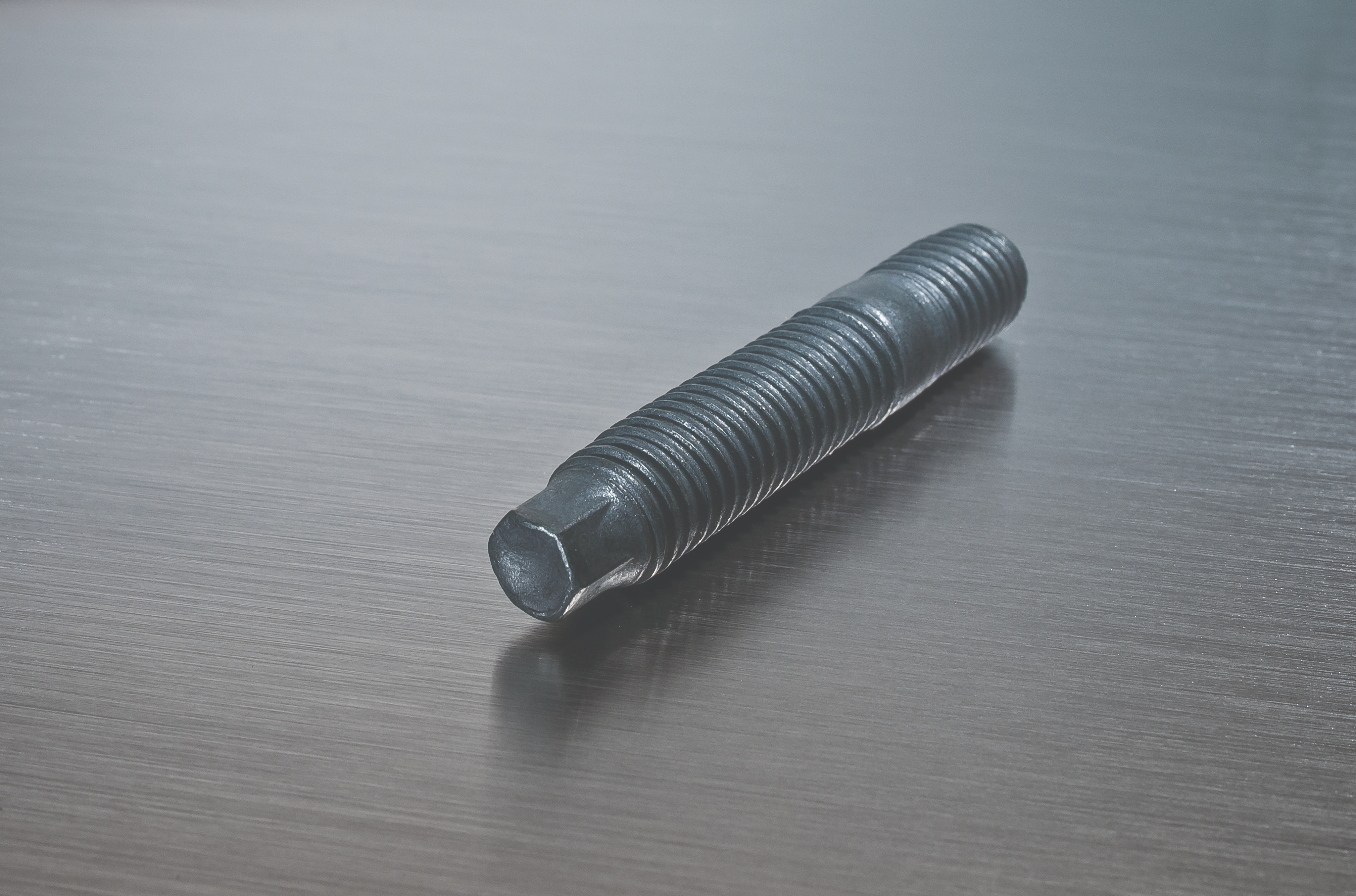 Automotive exhaust fastener